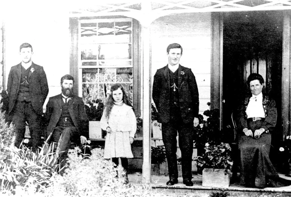 A later nineteenth-century South Island settler family outside their homestead
